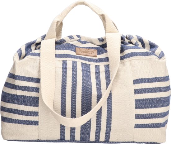 Grote stoffen tas met verticale marineblauwe strepen en crème, met beige hengsels en een leren label.