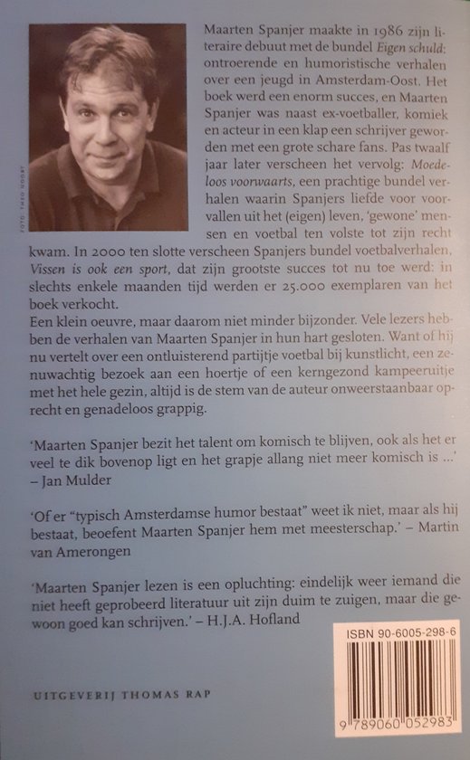 Portret van Maarten Spanjer met een grijze achtergrond. Hij draagt een donker overhemd.