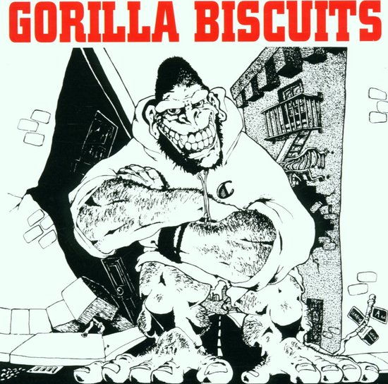 Tekening van een gorilla met een hoodie en gebalde vuisten, staand in een stadse omgeving. "GORILLA BISCUITS" in rode letters.