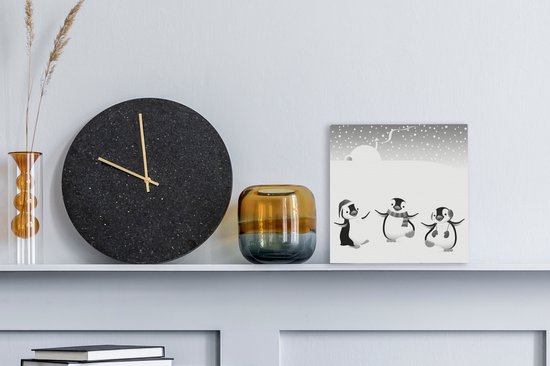 Tableau sur toile Une illustration de trois pingouins dans la neige - noir et blanc - 20x20 cm - Décoration murale
