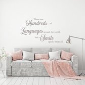 Muursticker There Are Hundreds Of Languages Around The World But A Smile -  Lichtgrijs -  120 x 70 cm  -  alle muurstickers  woonkamer  engelse teksten - Muursticker4Sale