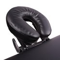 Zwarte, verstelbare hoofdsteun van de Alora massagetafel.