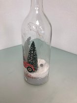 Fles met kerstsfeer