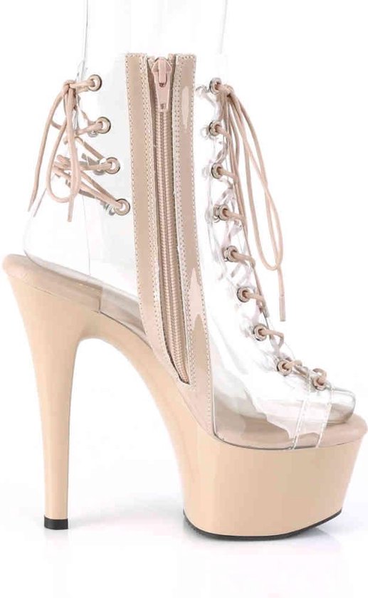 Botte compensée beige à tige transparente, lacets et fermeture éclair.