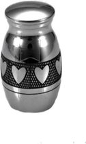 Mini Urn Zilverkleurig Hartjes Symbolen. Mooi klein urntje voor een grote
herinnering 7.5 ML inhoud.