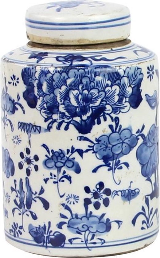 Kleine blauw-witte gemberpot met pioenroos en bloemendecoratie.