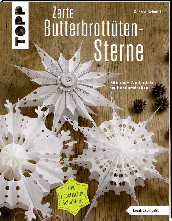 Boekomslag 'Zarte Butterbrottüten-Sterne' met witte papieren sterren.