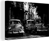 Canvas schilderij 150x100 cm - Wanddecoratie Cuba - Cadillacs - Oldtimers - Klassieke auto's in ochtendlicht - zwart wit - Muurdecoratie woonkamer - Slaapkamer decoratie - Kamer accessoires - Schilderijen
