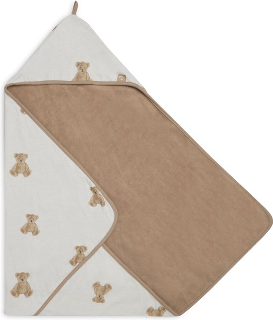 Une cape de bain marron avec un intérieur blanc imprimé d'oursons. La cape de bain est ouverte en losange.
