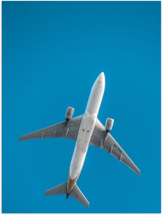 WallClassics - Poster Glanzend – Onderkant van Vliegtuig bij Blauwe Lucht - 30x40 cm Foto op Posterpapier met Glanzende Afwerking