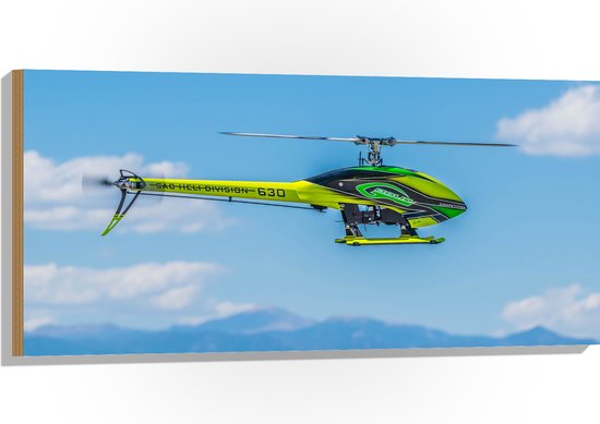 WallClassics - Hout - Geel Groene Helikopter bij Wolken - 100x50 cm - 12 mm dik - Foto op Hout (Met Ophangsysteem)