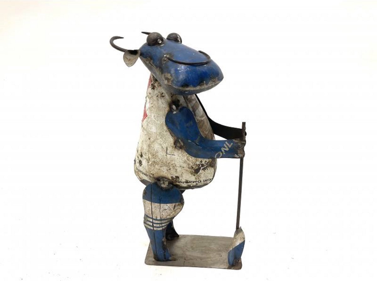 Cow farmer old iron