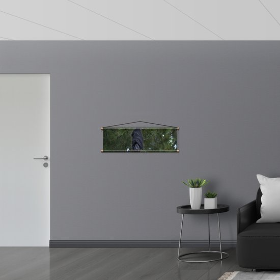 WallClassics - Affiche Textile - Chauve-Souris Accroche à un Arbre - 90x30 cm Photo sur Textile