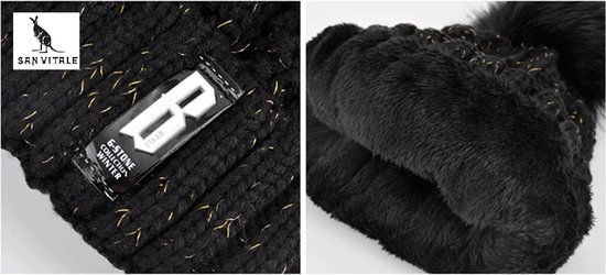 Close-up van de binnenkant van een zwarte muts met zachte fleece voering.