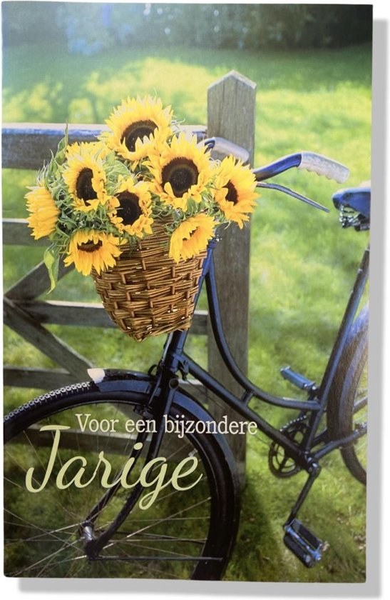 Wenskaart met een fiets, mand met zonnebloemen en de tekst 'Voor een bijzondere Jarige'.