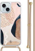 Casimoda® hoesje met beige koord - Geschikt voor iPhone 15 - Abstract Dots - Afneembaar koord - TPU/acryl - Bruin/beige