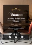 Publicité Sfeerwonen & ZO avec table, chaises et informations sur le produit.