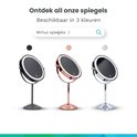 Drie make-up spiegels in het zwart, rosegoud en chroom.