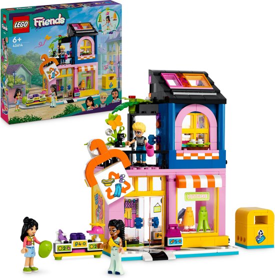 Magasin de vêtements vintage LEGO Friends avec figurines, accessoires et une poubelle jaune.