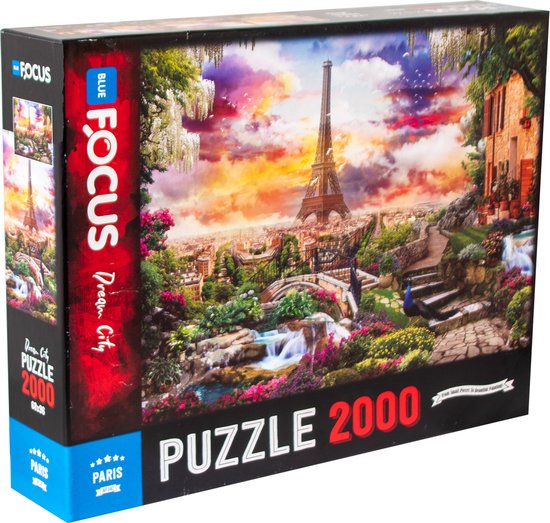 Boîte de puzzle Blue Focus 2000 pièces avec Tour Eiffel à Paris, jardin fleuri et cascade au coucher du soleil.