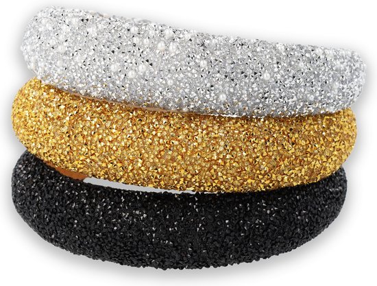Stapel brede haarbanden in zwart, goud en zilver, allemaal met glitters.