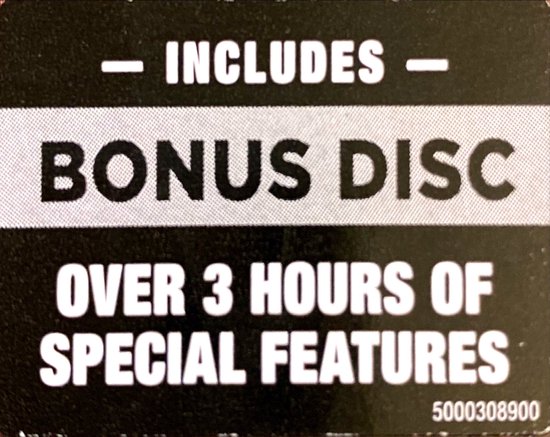 Tekst op een zwarte achtergrond: "- INBEGREPEN - BONUS DISC OVER 3 UUR SPECIAL FEATURES"