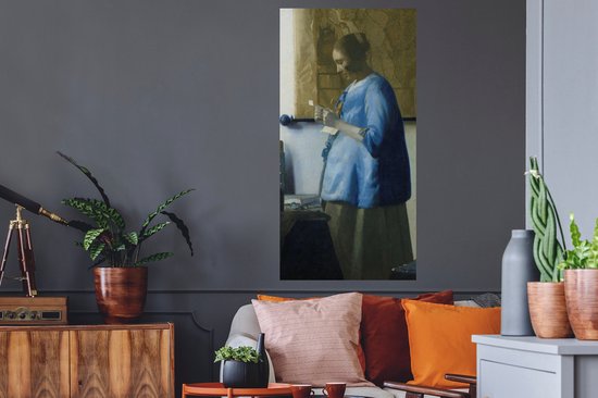 Muurstickers - Sticker Folie - Brieflezende vrouw in het blauw