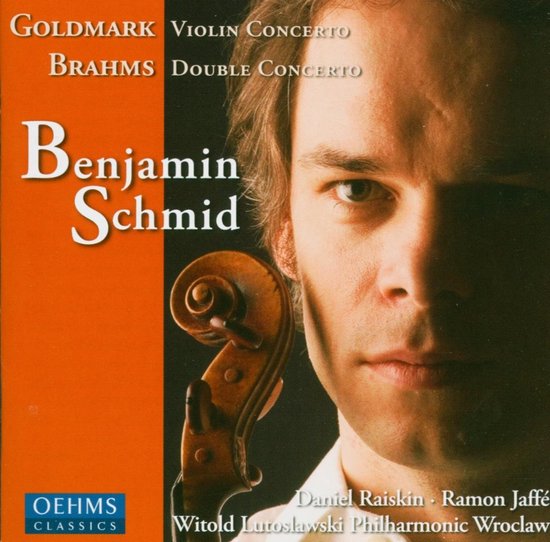 Close-up van Benjamin Schmid die een viool vasthoudt, met de tekst "Violin Concerto" en "Double Concerto" op de achtergrond.