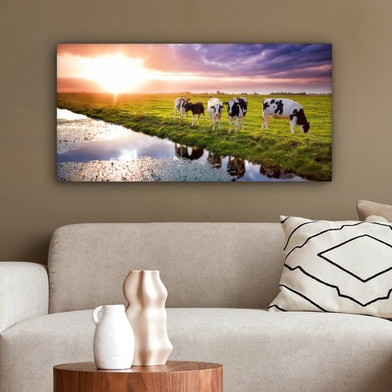 Tableau sur toile Vaches pendant un coucher de soleil - 80x40 cm - Décoration murale Art