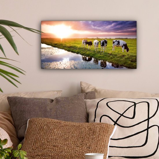 Tableau sur toile Vaches pendant un coucher de soleil - 40x20 cm - Décoration murale Art
