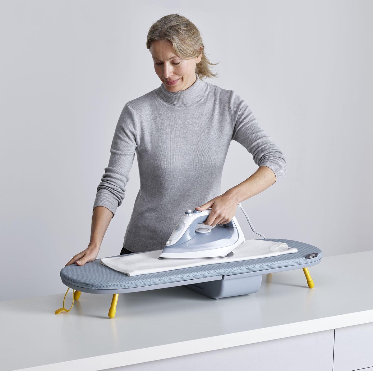 Joseph Joseph IronHub Wall Iron Holder and Storage Rack with Adjustable Ironing Board Hanger and Heat Resistant Ironing Pad