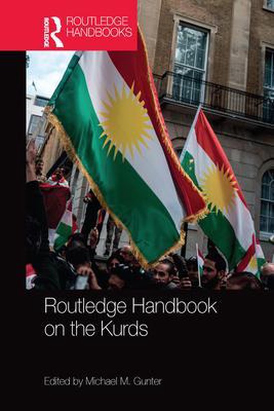 Boekomslag van 'Routledge Handbook on the Kurds' met twee Koerdische vlaggen en mensenmassa.