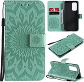 Voor OnePlus 9 Zon Embossing Patroon Horizontale Flip Leather Case met Kaartsleuf & Houder & Portemonnee & Lanyard (Groen)