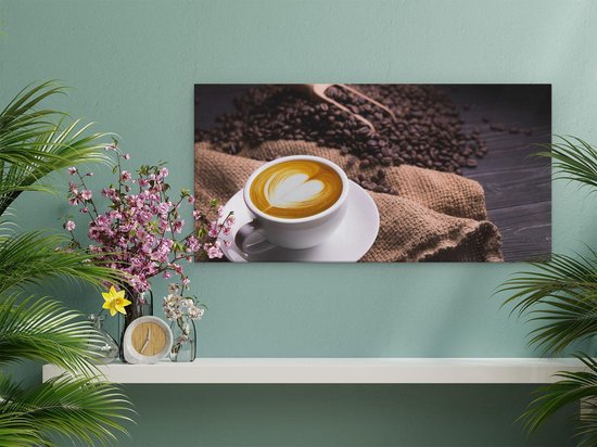 Artaza Canvas Schilderij Kopje Koffie In Een Hartje Met Koffiebonen - 60x30 cm - Wanddecoratie Woonkamer - Schilderijen - Muurdecoratie