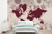Carte du monde rouge foncé sur fond rose clair ornée d'illustrations de fleurs 600x400 cm