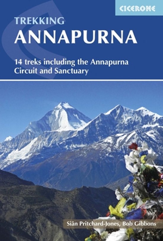 Livre "Trekking Annapurna" avec 14 randonnées, y compris le Circuit et le Sanctuaire d'Annapurna. Sur la couverture, un sommet enneigé et des drapeaux de prière.