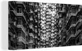 Canvas Schilderij Verlaten flatgebouwen in Hong Kong - zwart wit - 40x20 cm - Wanddecoratie