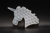 Pop It – Fidget Toy Spel – Anti Stress, Autisme en ADHD - Vrij van Giftige Materialen- TikTok Hype 2021 - Fotochromisch Wit Unicorn - Verandert van kleur onder de Zon