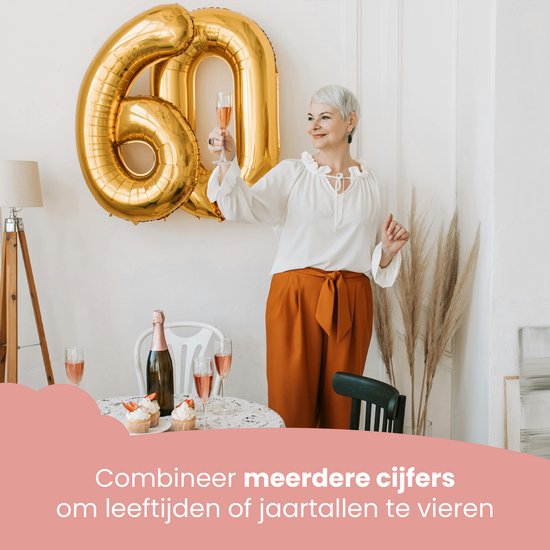 Gouden cijfer 60 ballon met champagneglazen en cupcakes