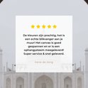 Un témoignage de quatre étoiles sur une peinture du Taj Mahal, avec le texte 'Les couleurs sont magnifiques, c'est un véritable accroche-regard !'.