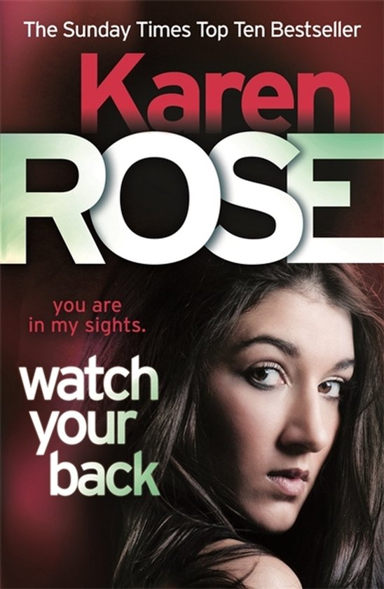 Boekomslag: Karen Rose, "Watch Your Back" met een vrouw op de voorgrond. De tekst "The Sunday Times Top Ten Bestseller" staat bovenaan.