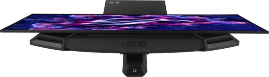 Bovenaanzicht van een zwarte ASUS ROG monitor met gedetailleerd stand en een levendige achtergrond op het scherm.
