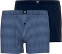 Twee Ceceba boxershorts: één met pied-de-poule patroon, één effen donkerblauw.