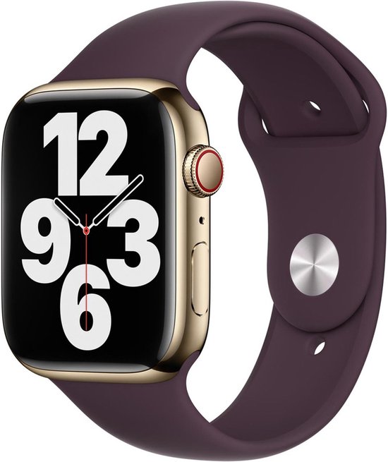 Apple Watch dorée avec un bracelet Apple Sport violet.