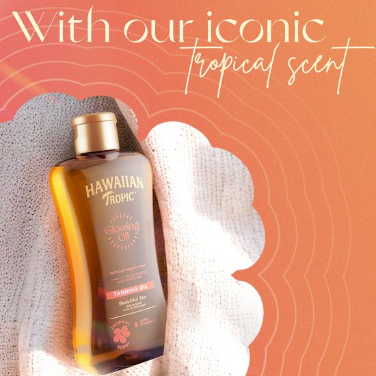 Hawaiian Tropic Tanning Oil Glowing Oil in een doorzichtige fles met gouden dop. De olie zit op een lichtgekleurde, gebreide stof.