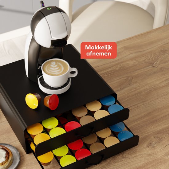 Porte-capsules noir à 2 tiroirs sous une machine à café Dolce Gusto, rempli de capsules.