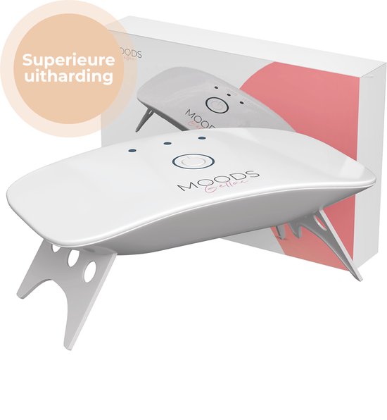 Witte MOODS Gellac mini nagellamp in de verpakking, met tekst 'Superieure uitharding'.