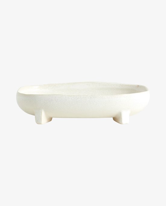 Offwhite keramieken schaal met vier pootjes en een egale binnenkant.