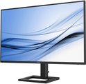 Monitor met zwarte randen en blauwe golvende achtergrond.