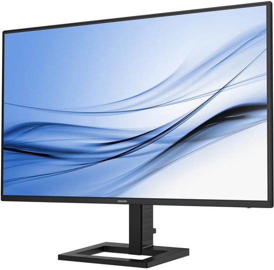 Monitor met zwarte randen en blauwe golvende achtergrond.